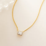 gold cubic zirconia halo emerald cut diamond necklace 