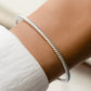 model wearing twisted cuff bracelet