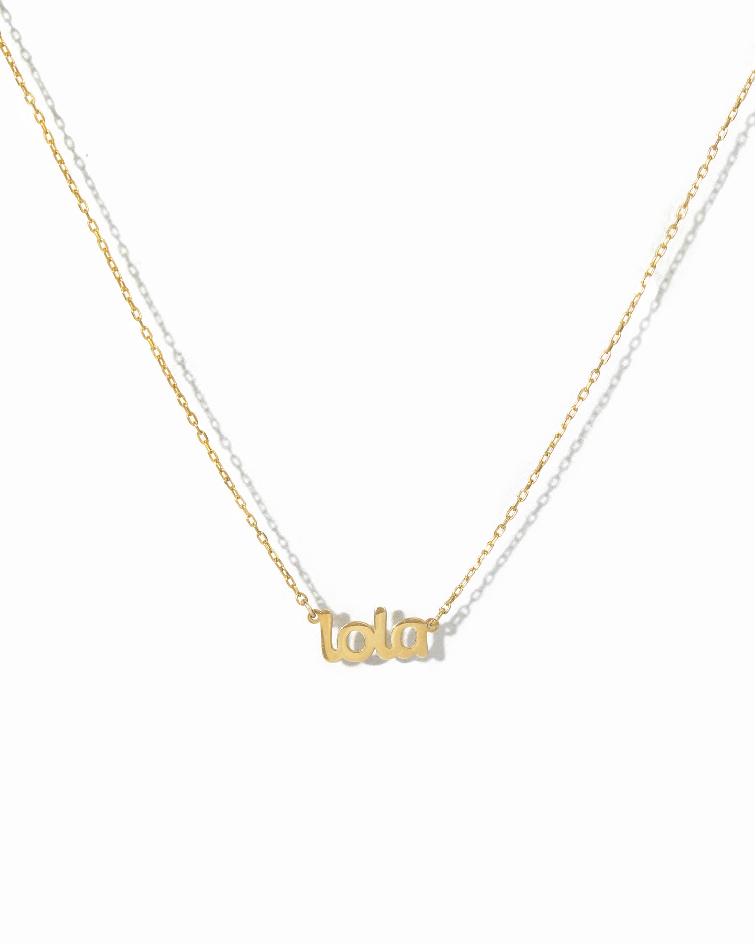 gold name plate necklace.