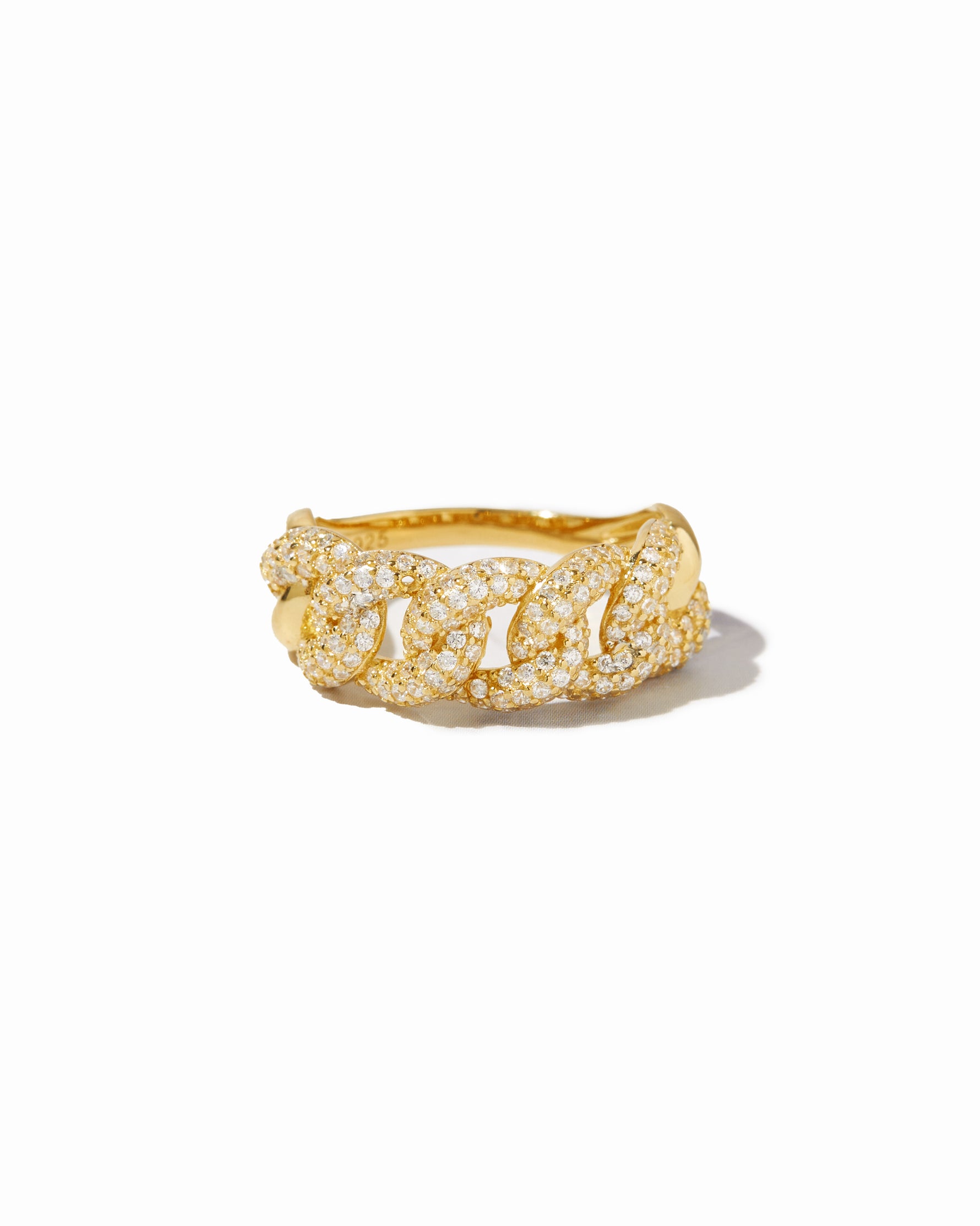 closeup image of chunky gold chain ring with pave cz stones