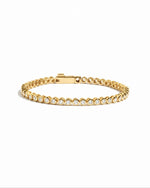 closeup image of round bezel tennis bracelet