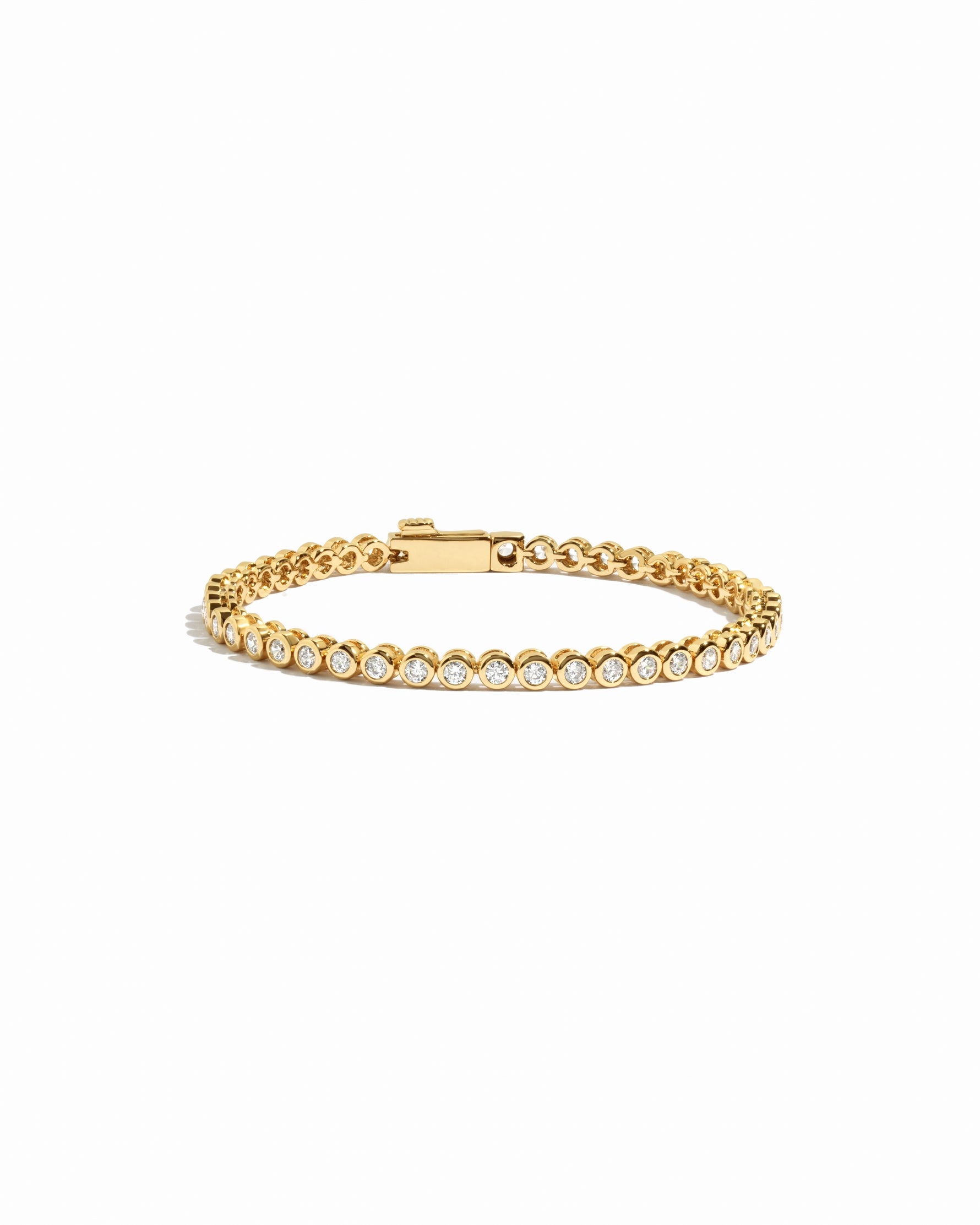 closeup image of round bezel tennis bracelet