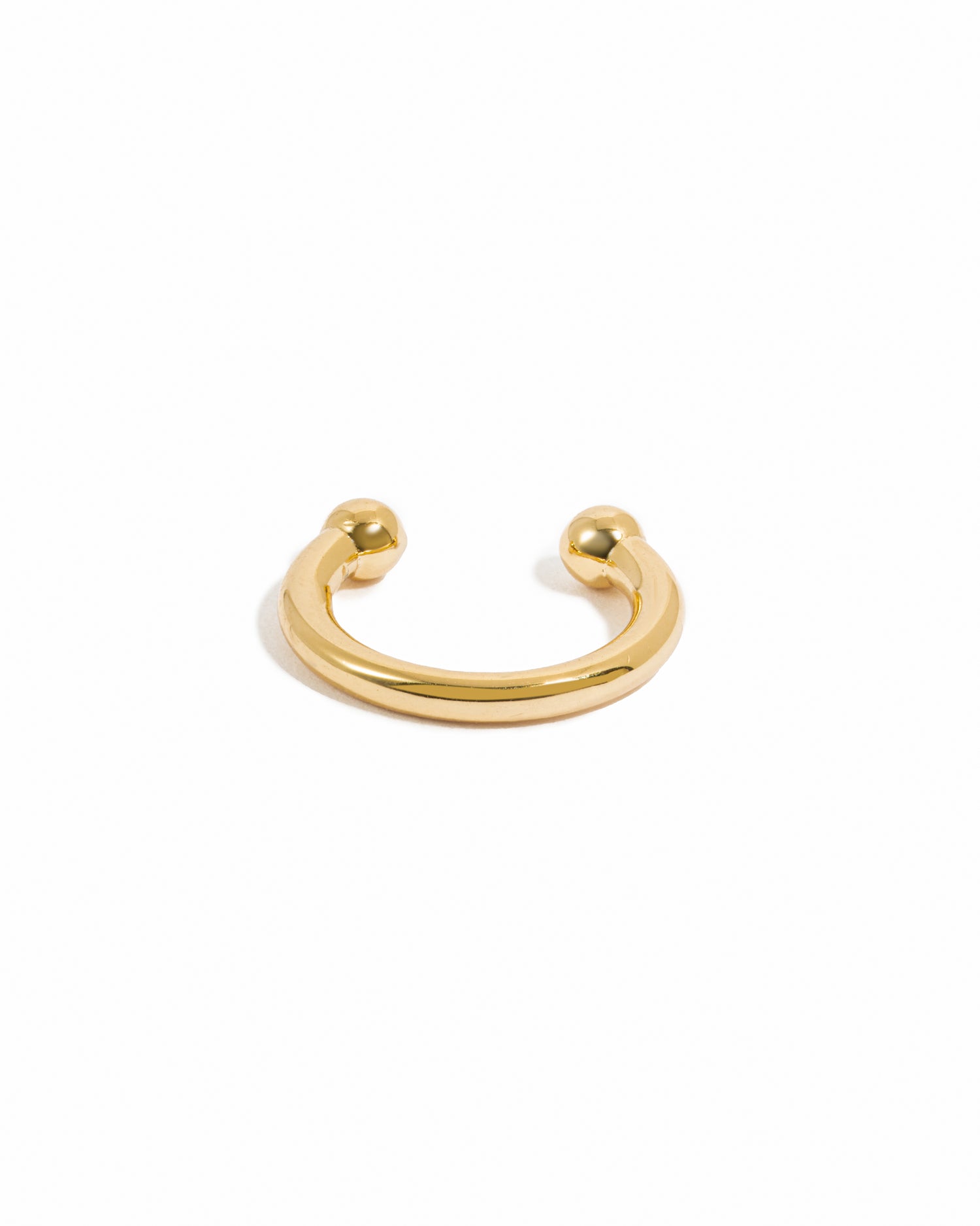 Dainty gold ear cuff earring.
