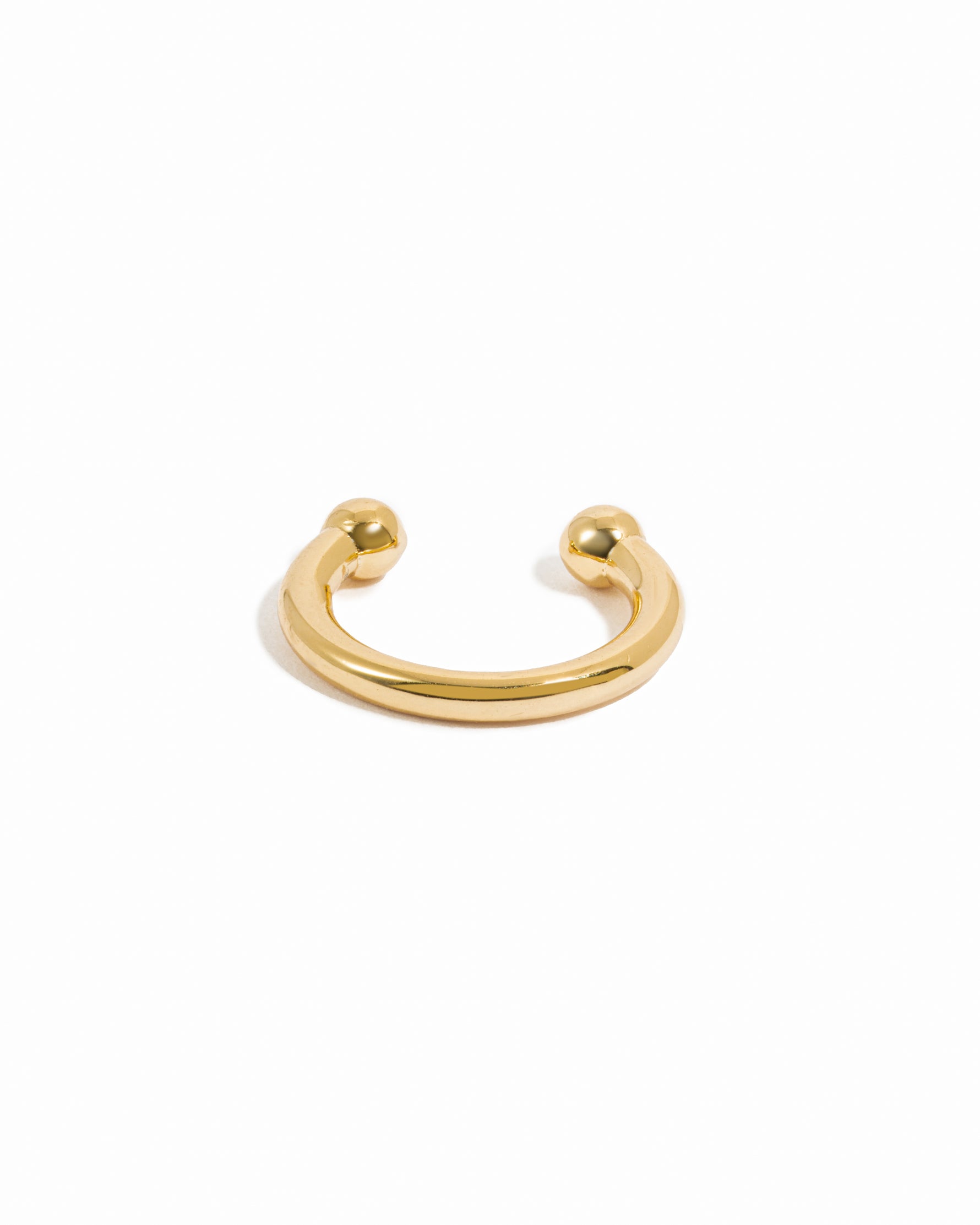 Dainty gold ear cuff earring.