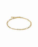 Gold bracelet on a white background