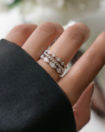 Model wearing 925 sterling silver jewelry set featuring silver stackable rings 