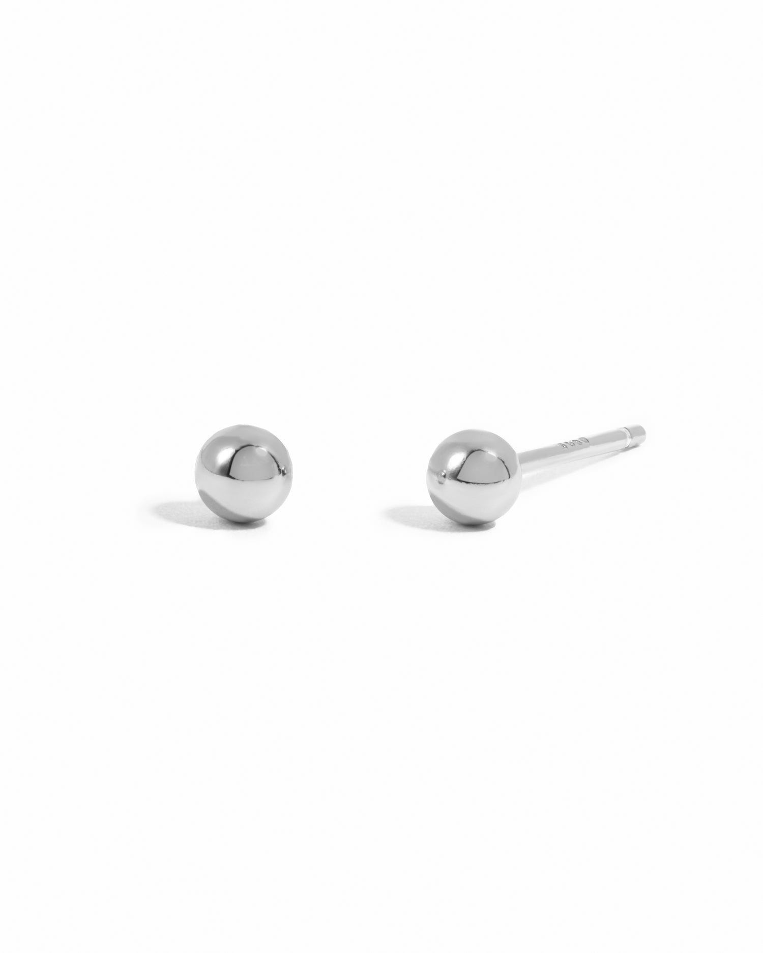 Sterling silver bead stud earrings.