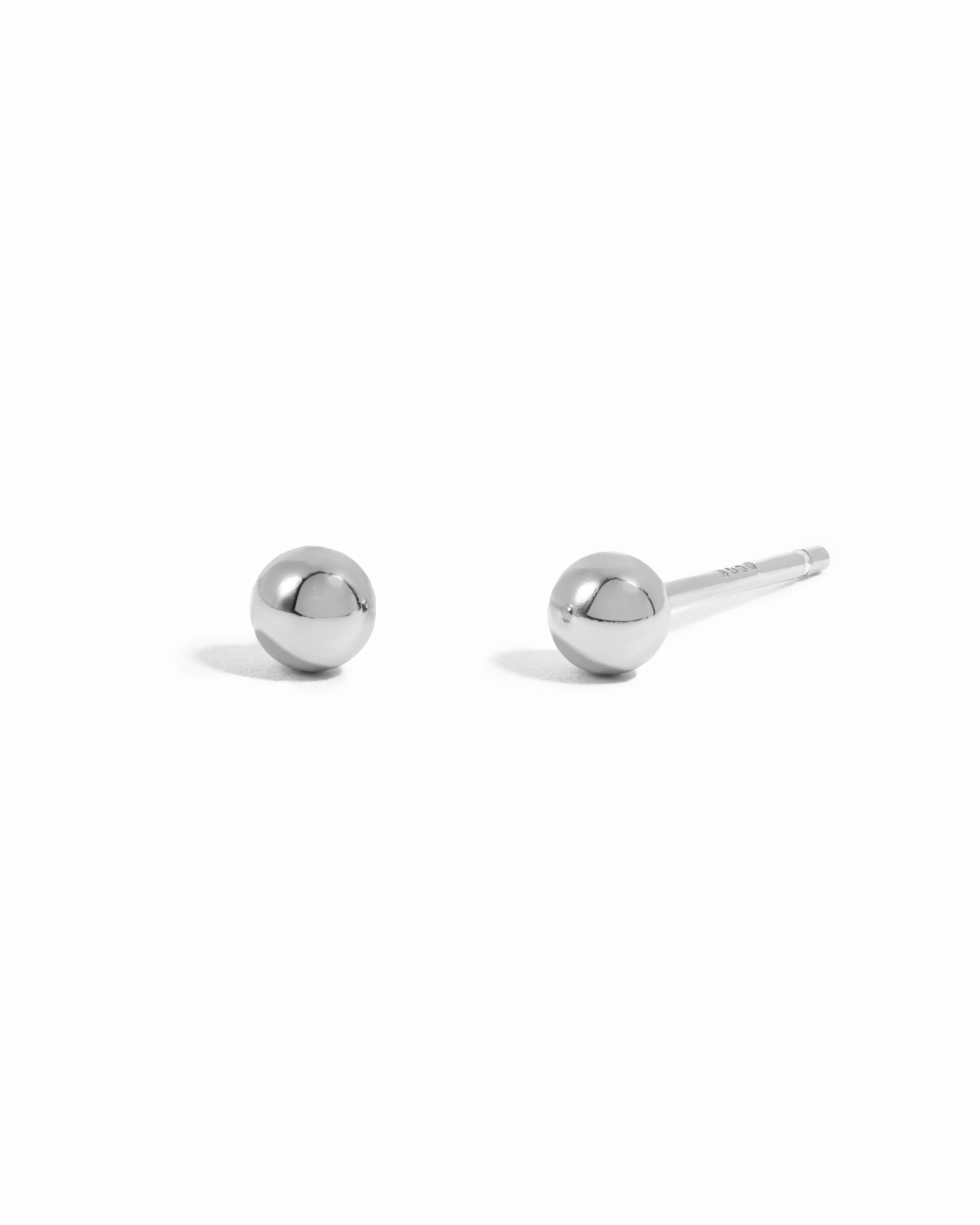 Sterling silver bead stud earrings.