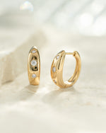 Gold huggie hoop star earrings