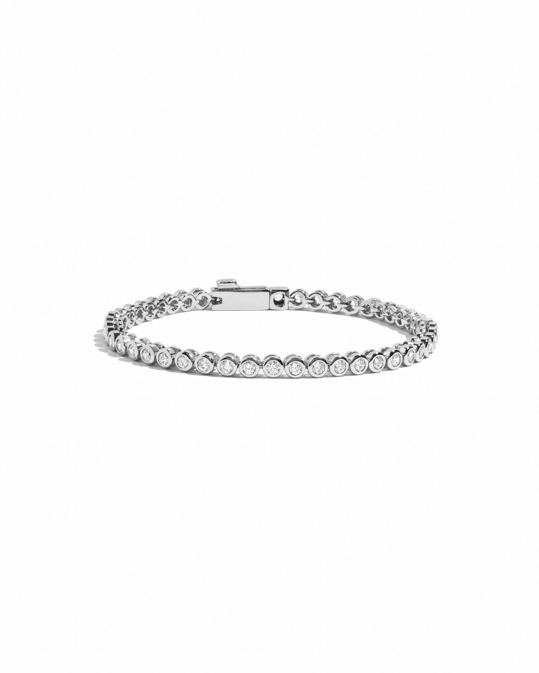 Sami Jewels 2.5mm round bezel tennis bracelet with sparkling diamonds, elegant jewelry accessory on a white background
