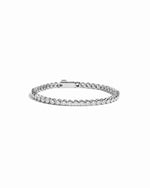 closeup image of silver round bezel tennis bracelet