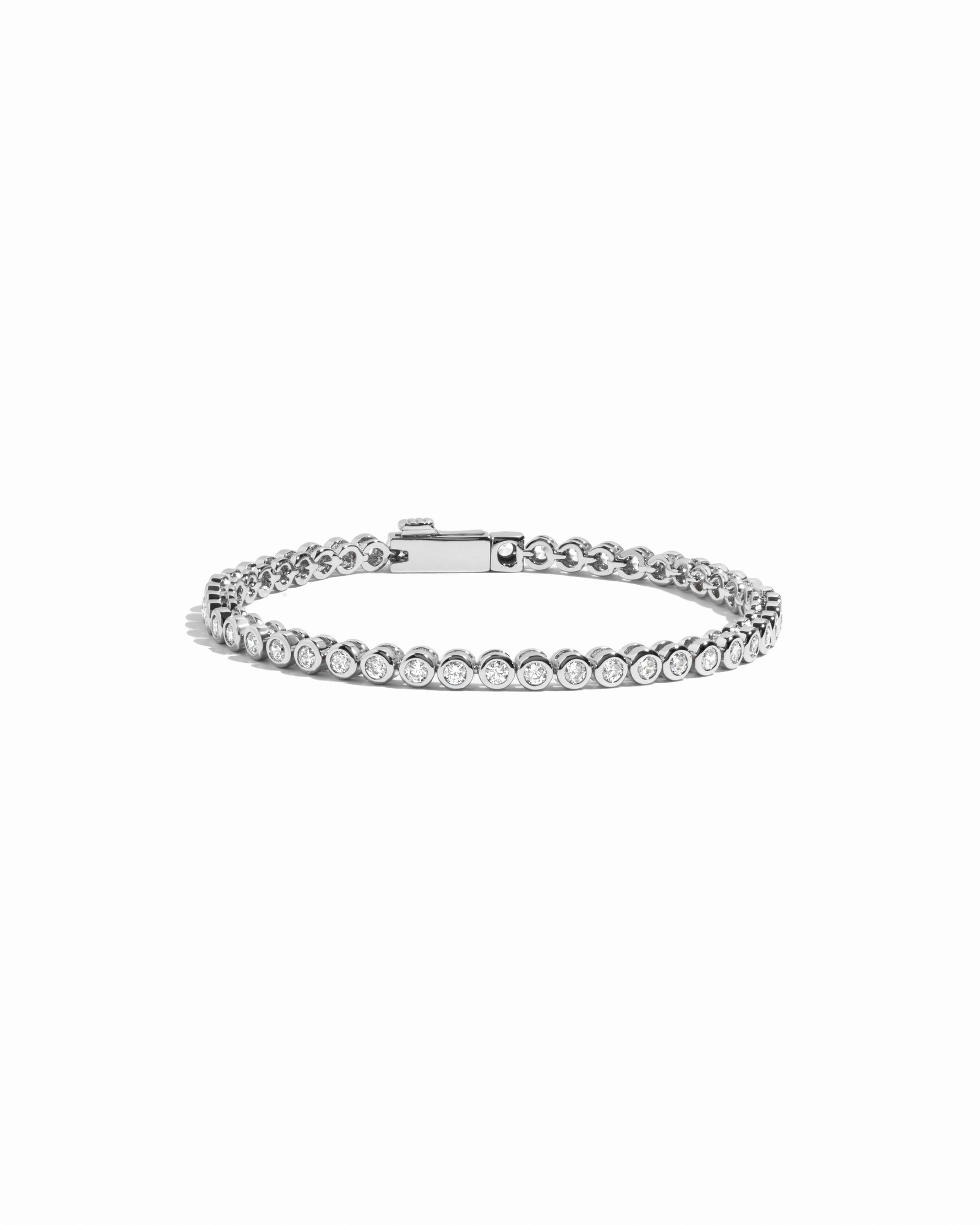 closeup image of silver round bezel tennis bracelet