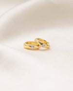 minimalist dome hoop earring in gold