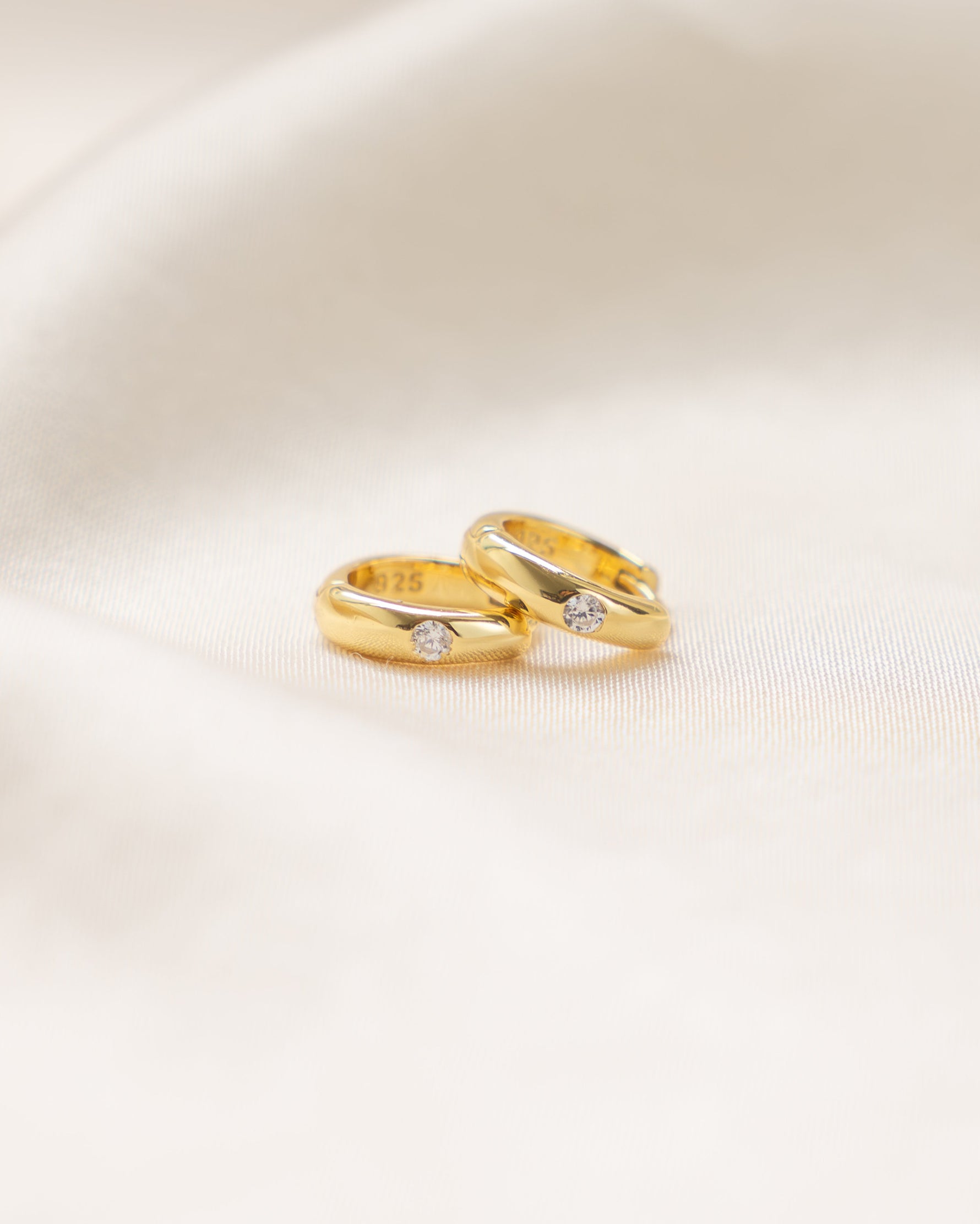 minimalist dome hoop earring in gold
