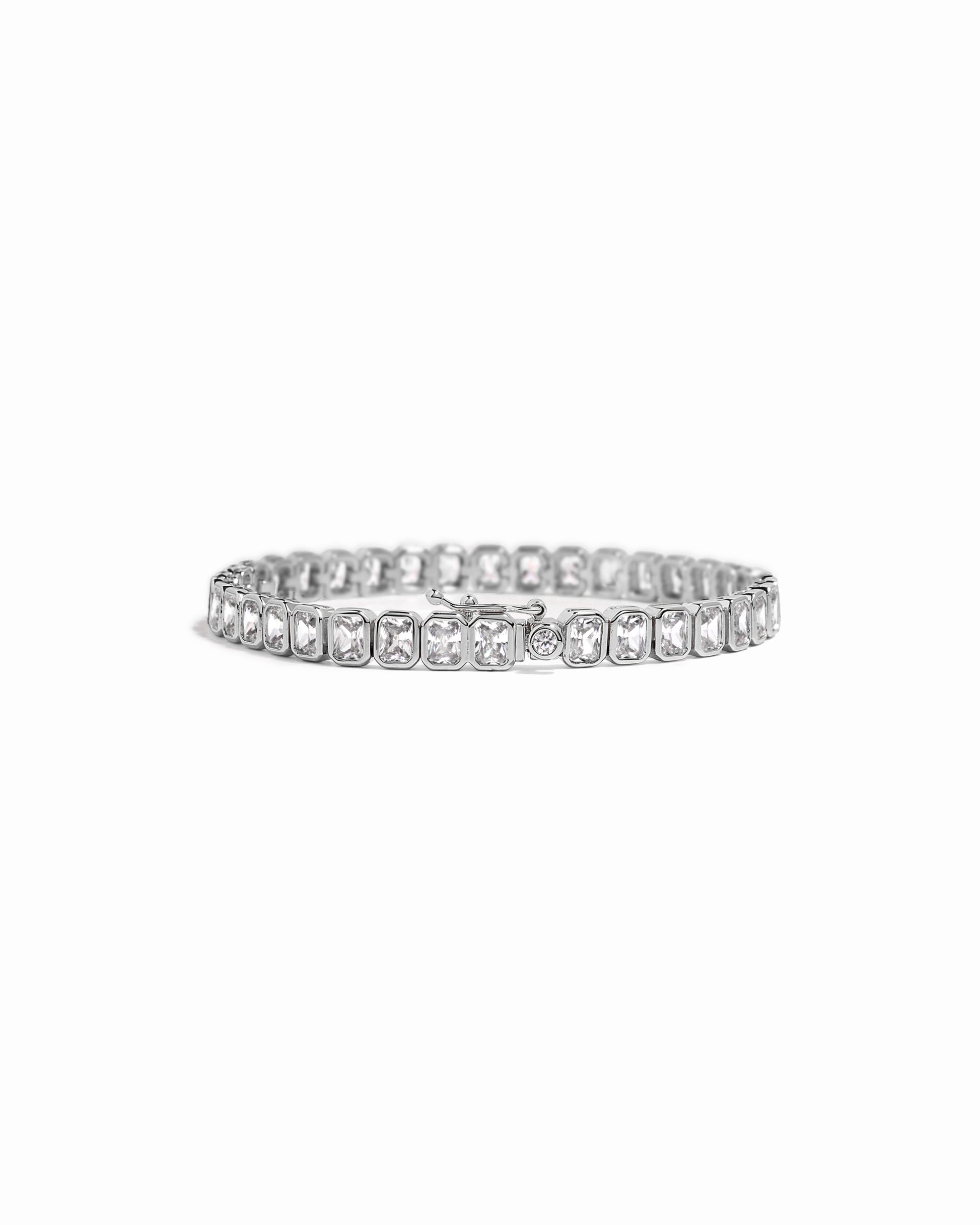 silver emerald bezel set tennis bracelet