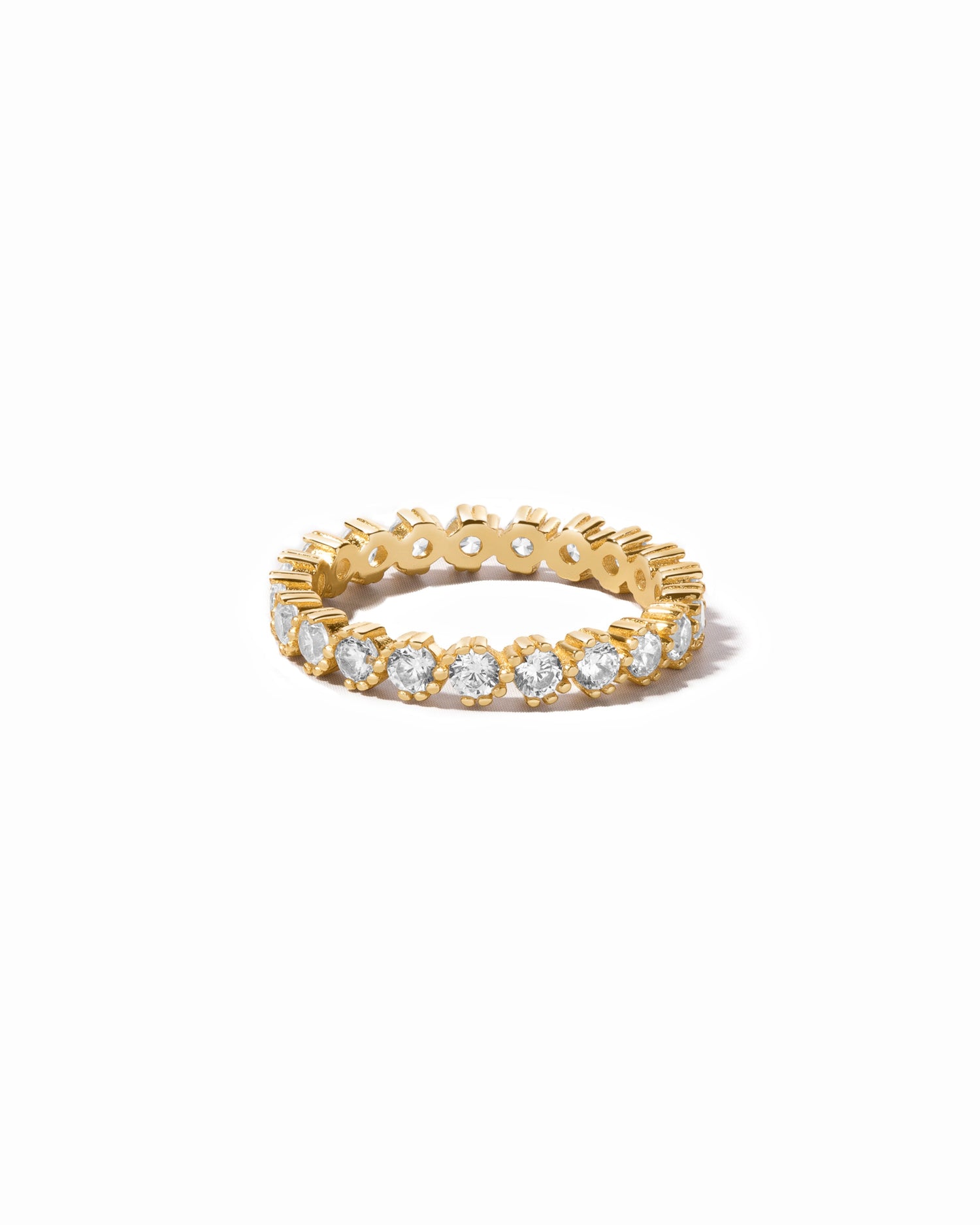 gold eternity ring with cubic zirconia dimaonds