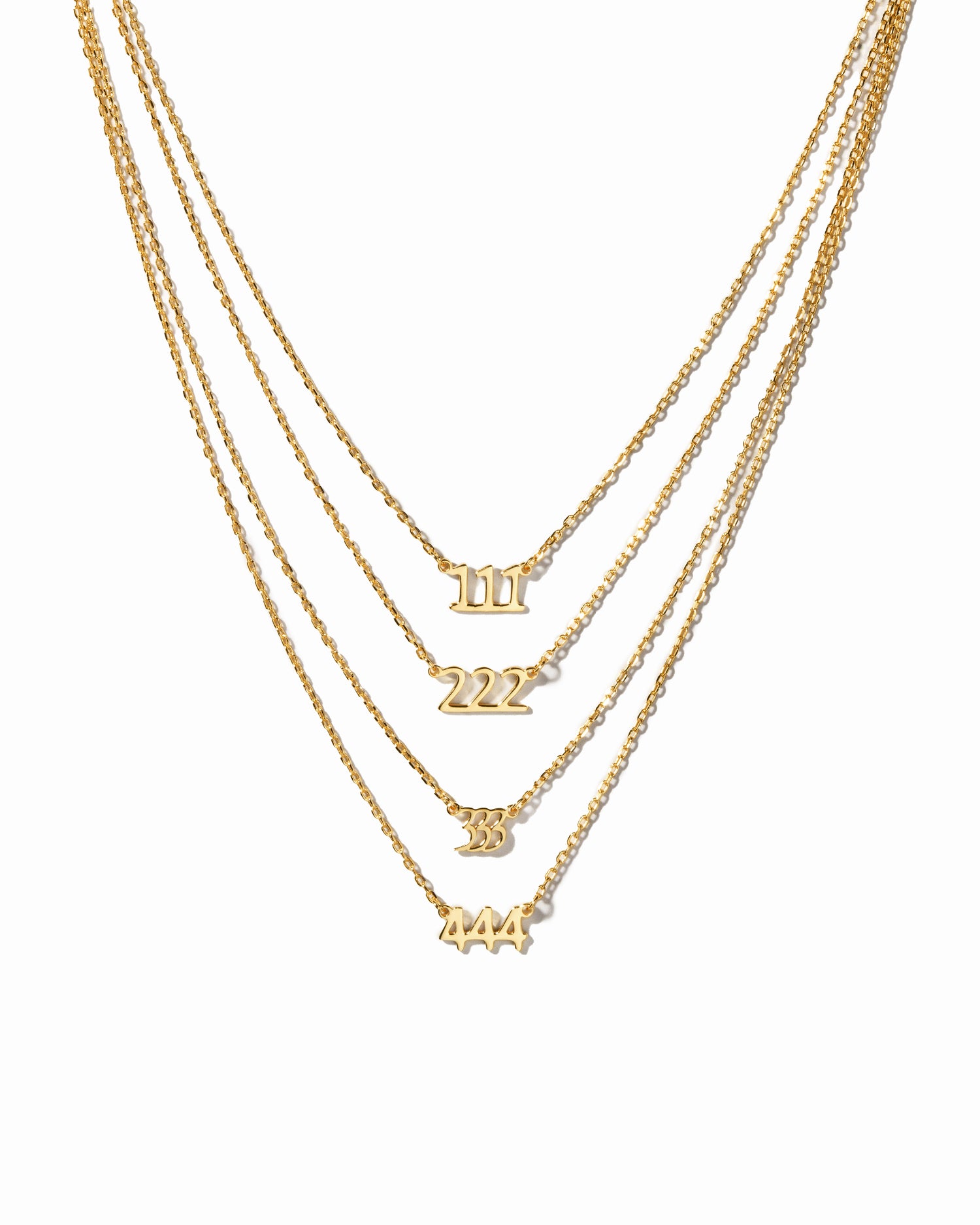 Gold angel number necklaces showcasing the different angel numbers 