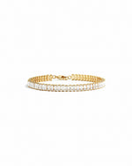 gold baguette bracelet with lobster clasp closure