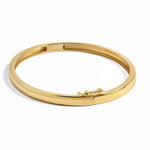 image showing a gold bangle bracelet and its latch clasp