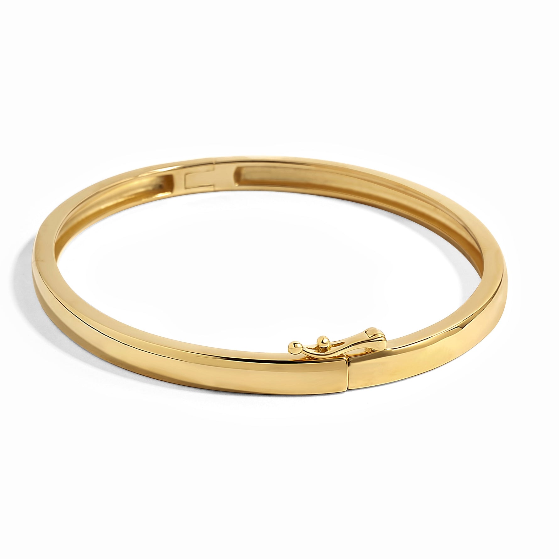 image showing a gold bangle bracelet and its latch clasp