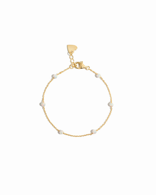 white opal beaded bracelet in gold