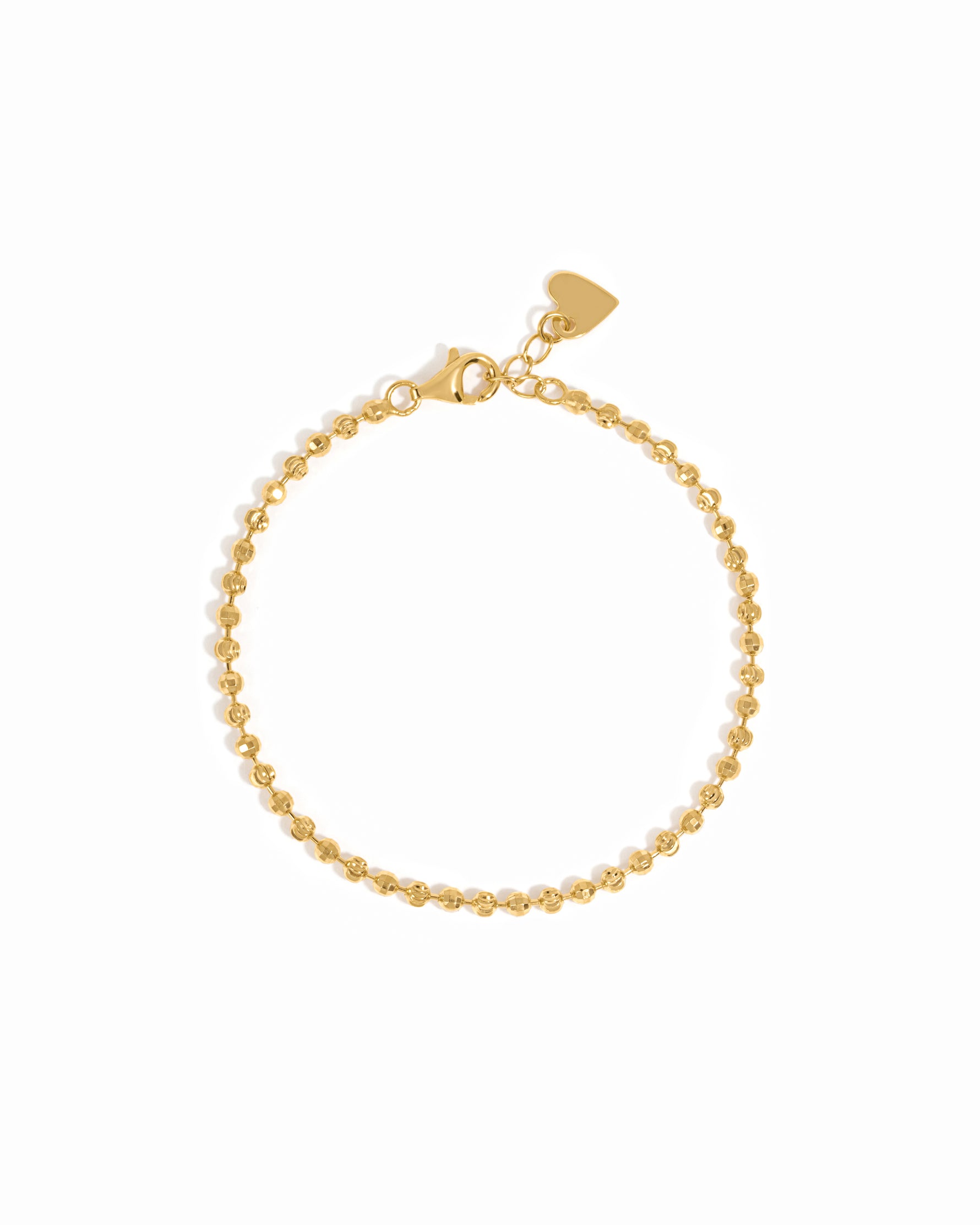 Gold chain bracelet on white background