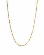 closeup image of gold rice beaded chain necklace