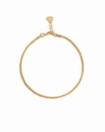 Gold chain bracelet on a white background