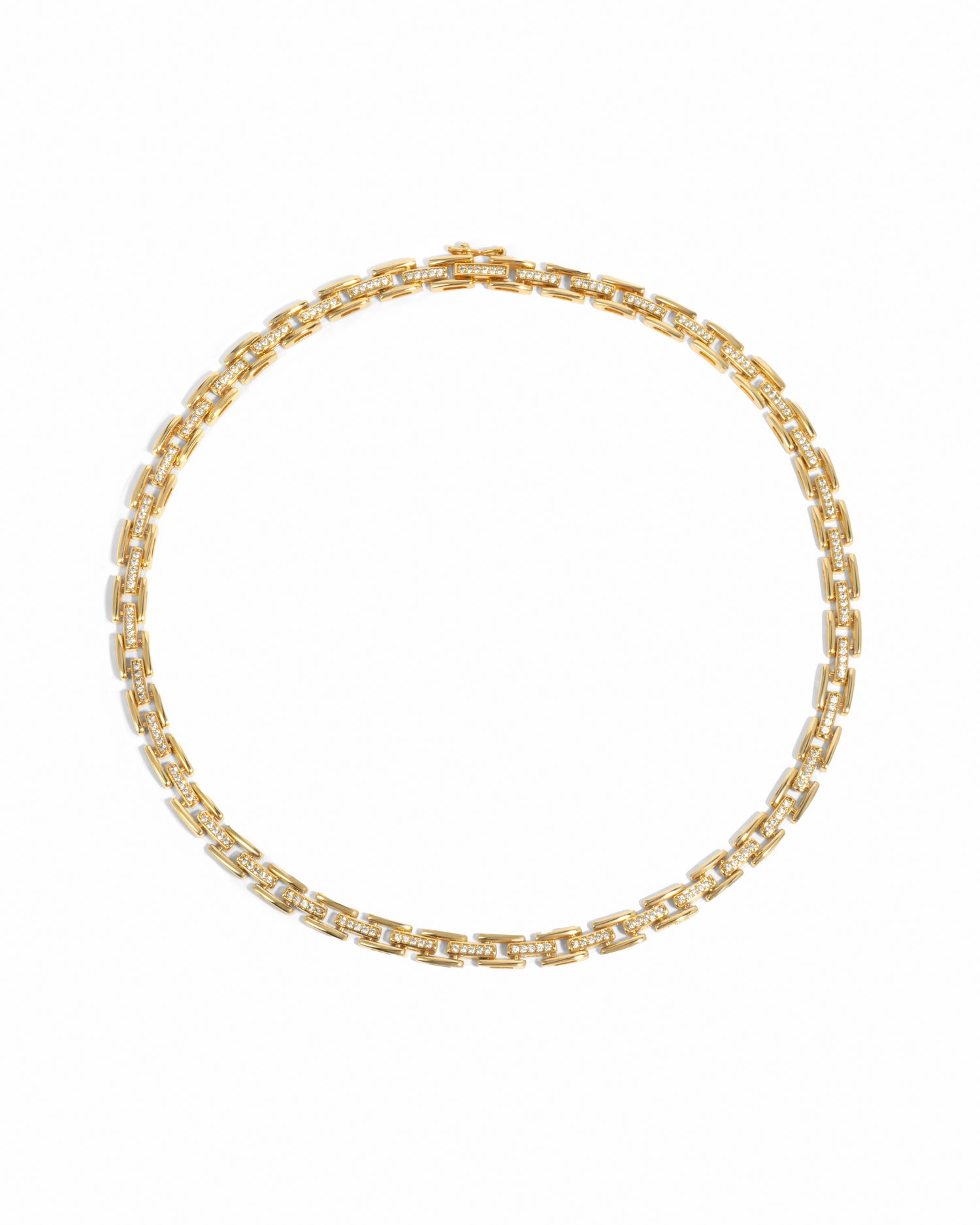 Gold chain necklace on a white background