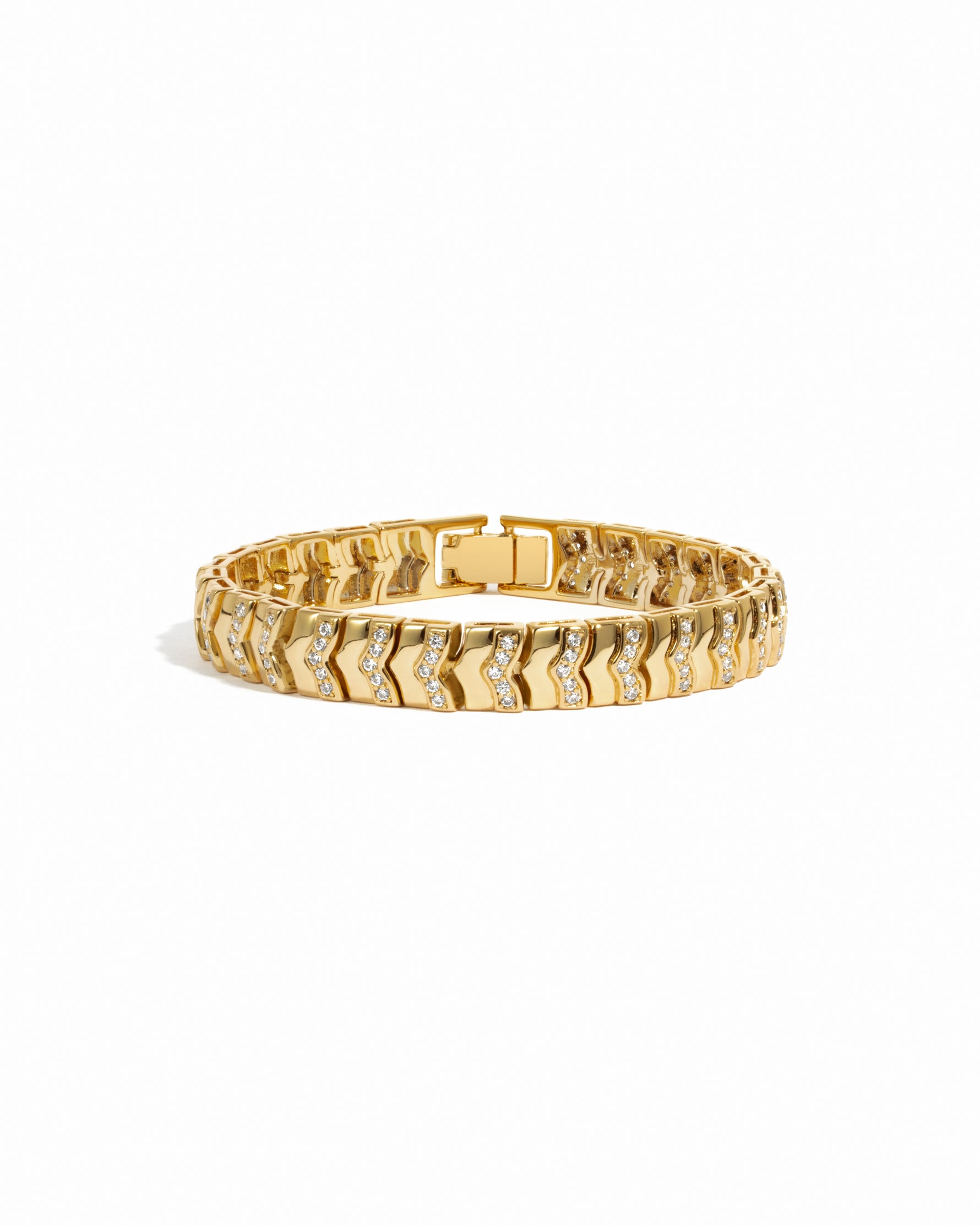 Gold stackable diamond tennis bracelet on a white background 