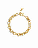 Closeup image of chunky gold bracelet