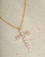 Gold layering necklace with a diamond cross pendant, perfect gift for her for the holidays