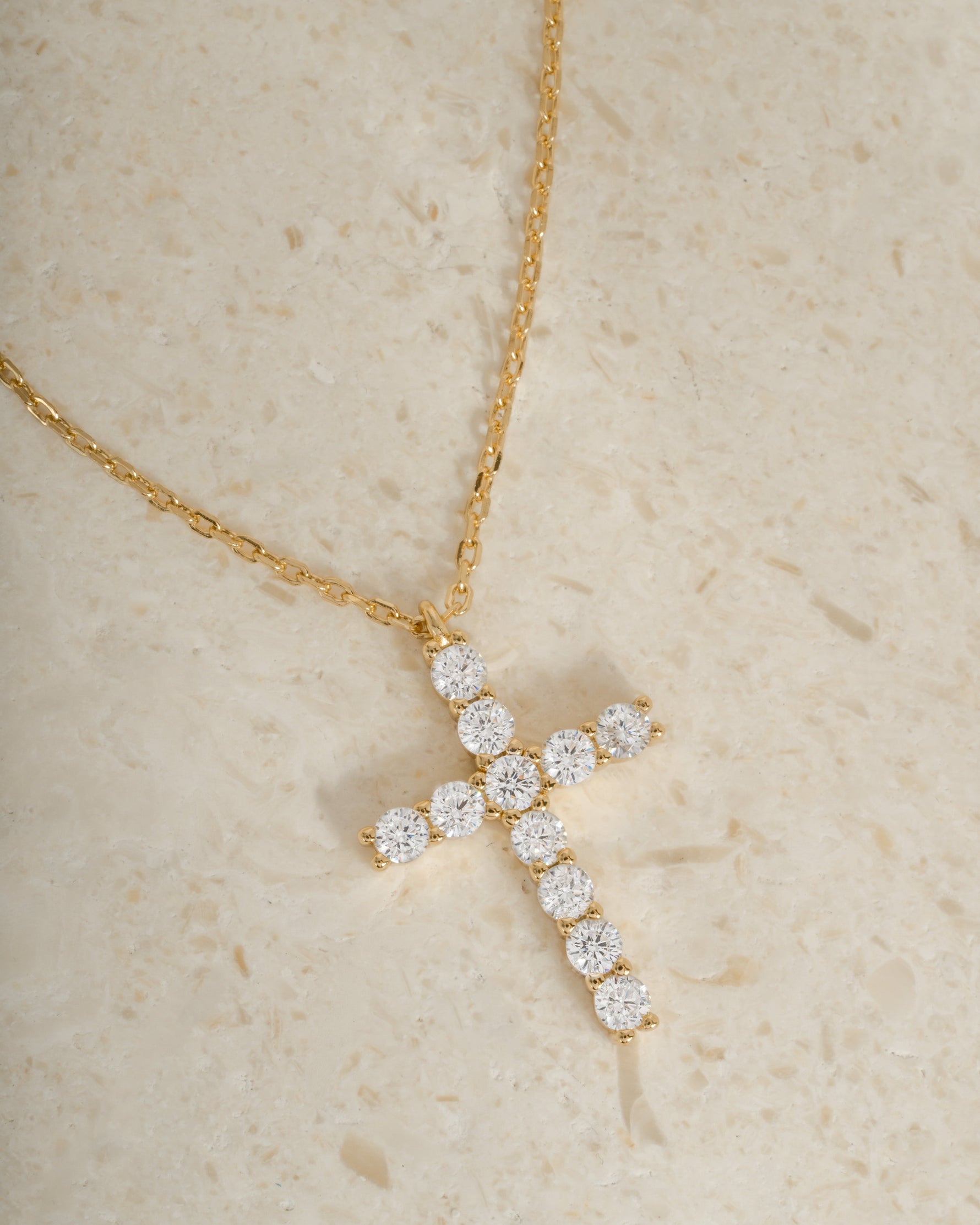 Gold layering necklace with a diamond cross pendant, perfect gift for her for the holidays