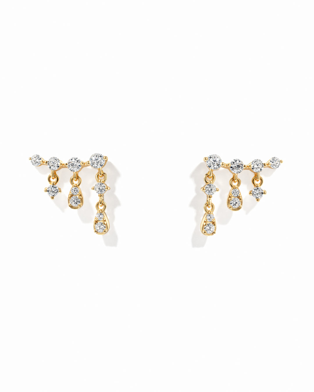 Gold ear climber earrings with cubic zirconia stones from Sami Jewels, featuring a dangling, stylish design.