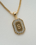 gold custom pendant with cubic zirconia diamond and "S" engraved 