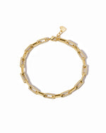 Dainty diamond paperclip bracelet featuring alternating pavé links displayed on a clean white background.