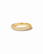 closeup image of gold ring with pave cubic zirconia stones 