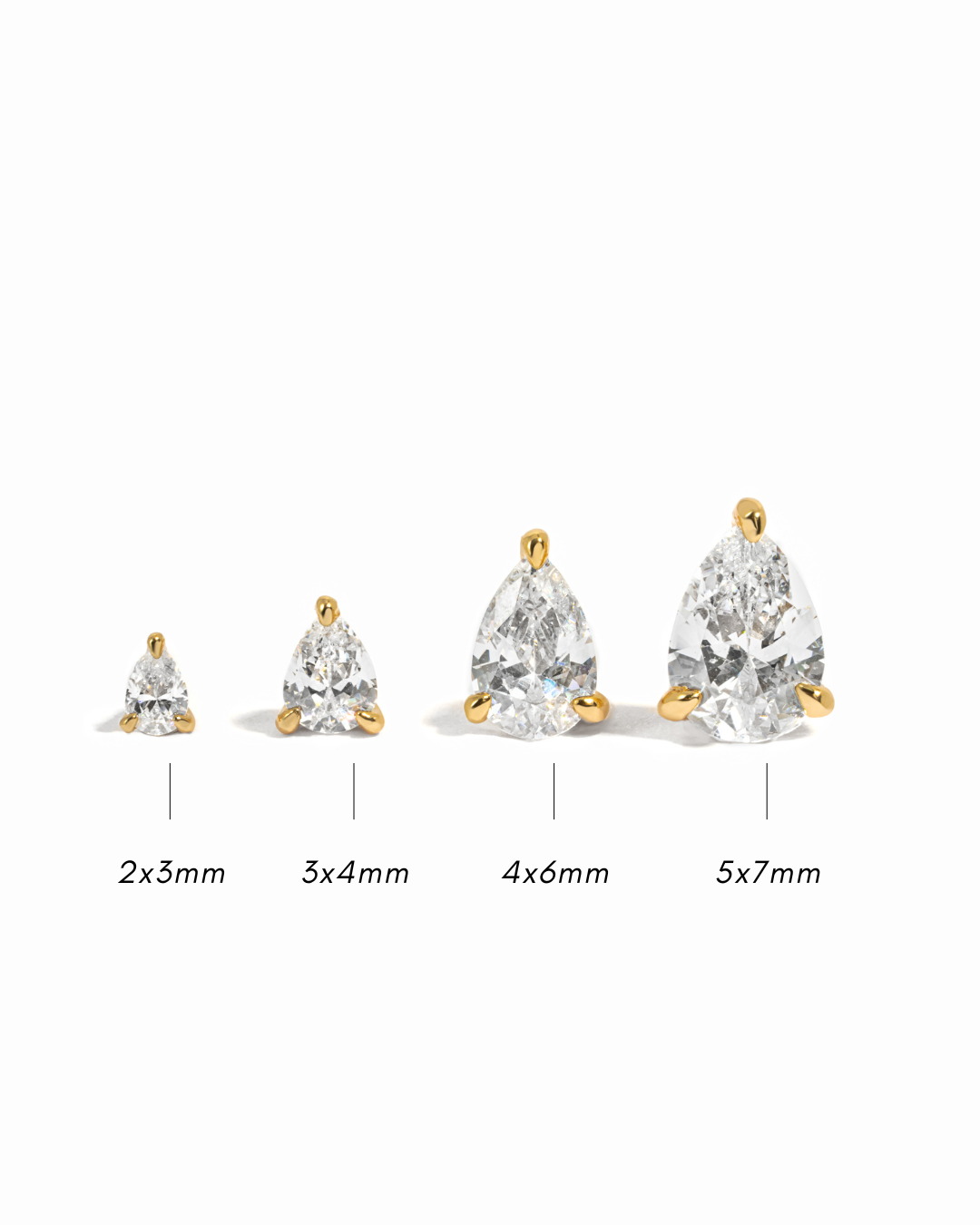 Pear cut diamond earrings in various sizes, one tiny pear cut earring in 2x3mm, another diamond stud earring in 3x4mm, a bigger delicate stud earring in 4x6mm, and lastly our biggest pear cut stud earring size variation in a 5x7mm all on a white background