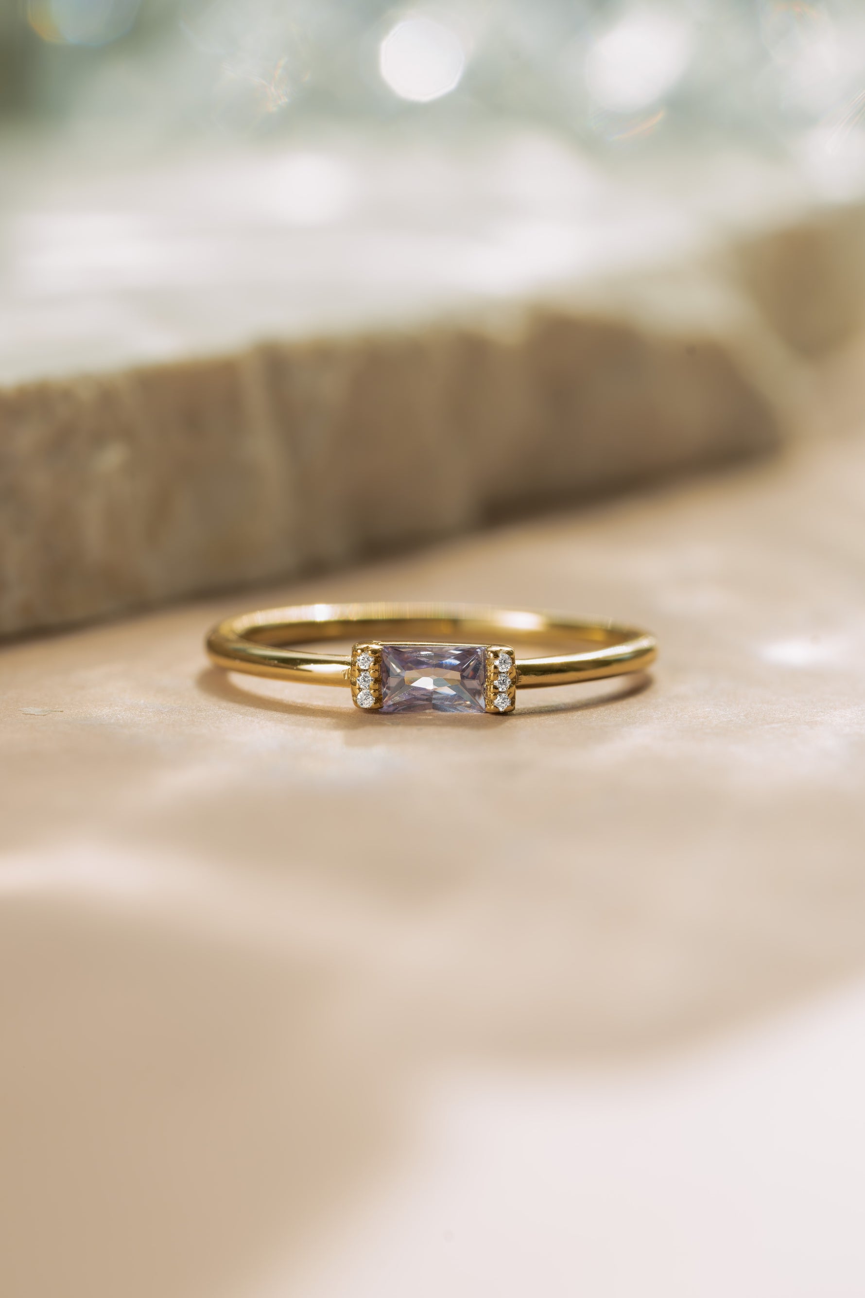 Gold light amethyst baguette cut ring