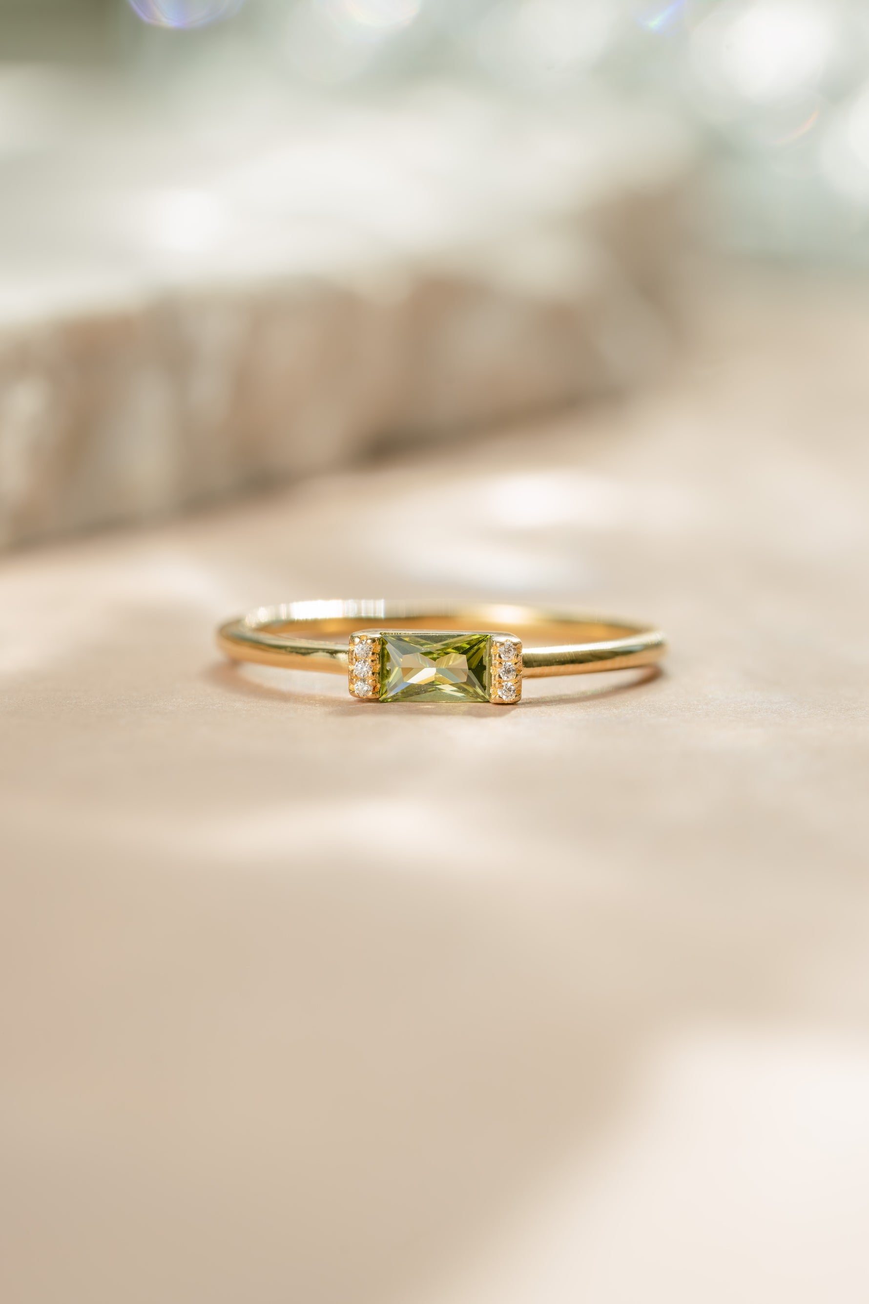 Gold peridot dainty baguette cut ring