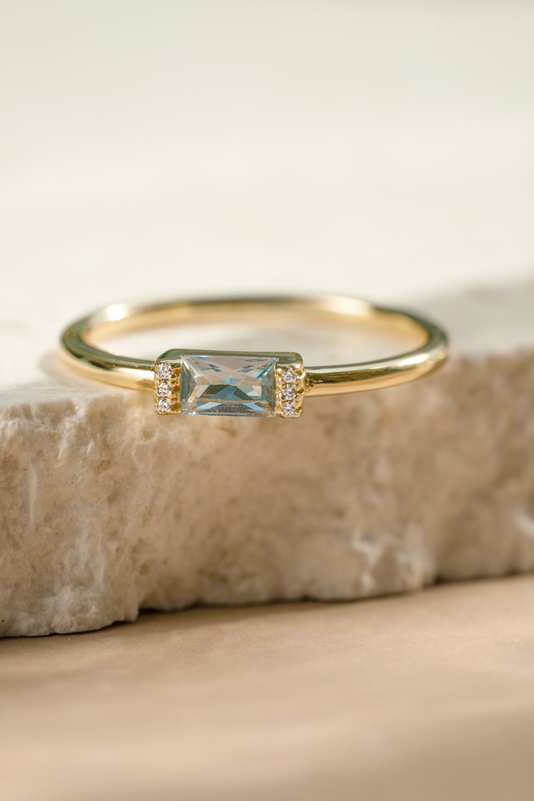 Gold diamond blue topaz baguette ring 