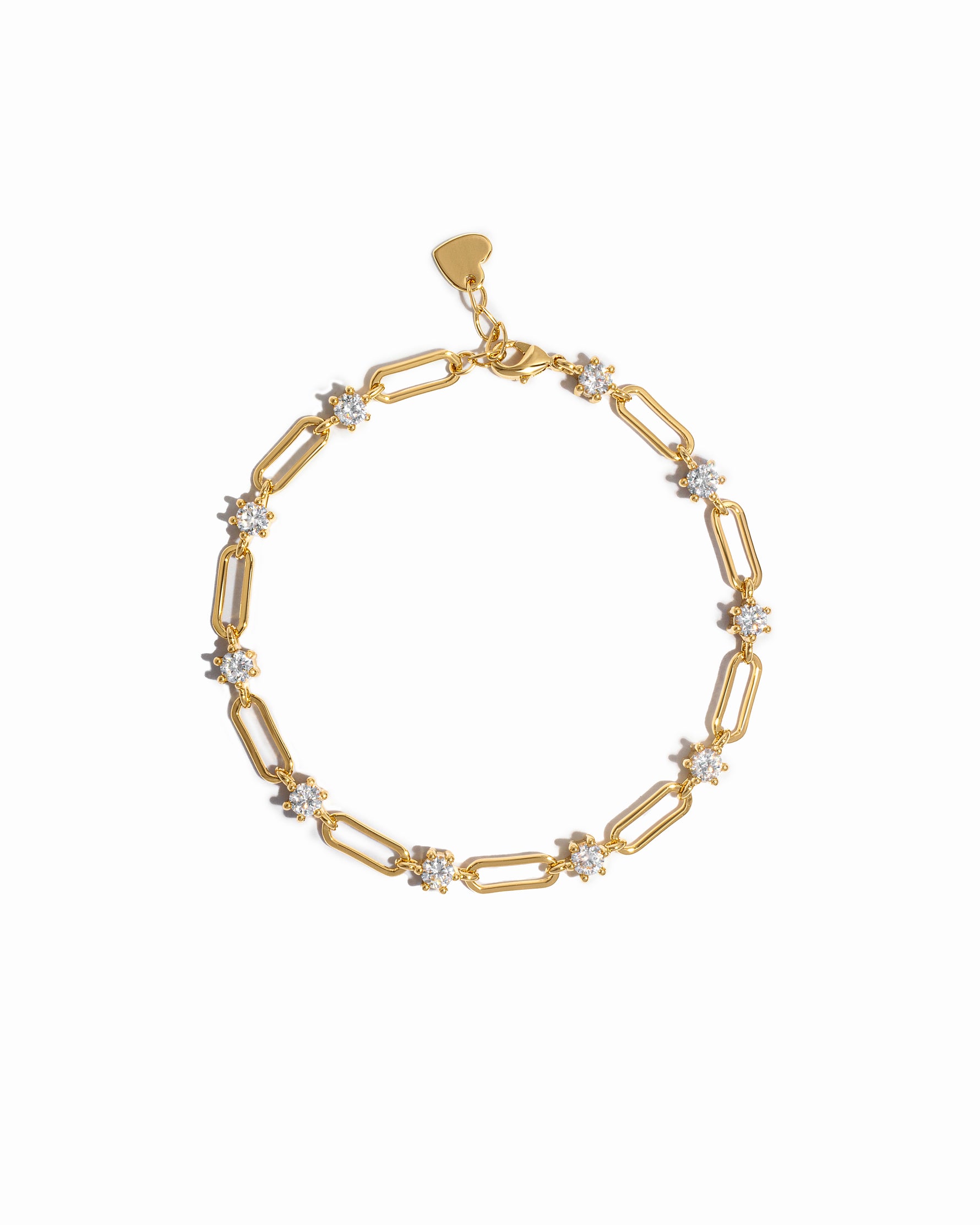 Gold paperclip chain bracelet on a white background