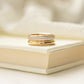closeup image of a statement ring featuring  a unique design