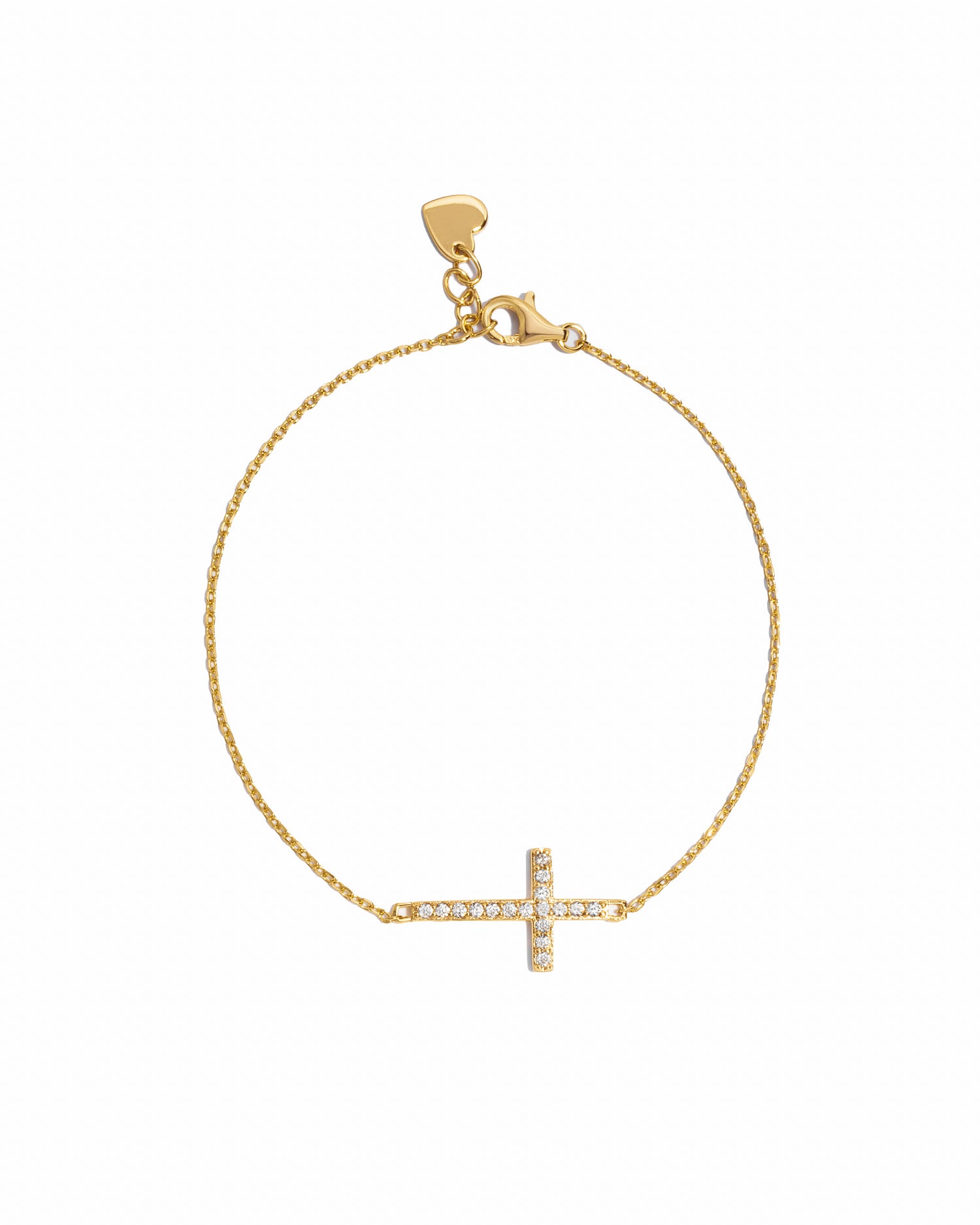 Gold bracelet with a small cross charm on a white background