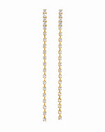 close up of gold diamond dangle earrings with a smooth, slender line of sparkling cubic zirconia, perfect for bridal earrings or wedding jewelry.
