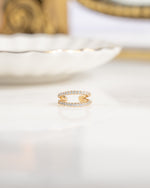closeup image of gold minimalist cz earring cuff
