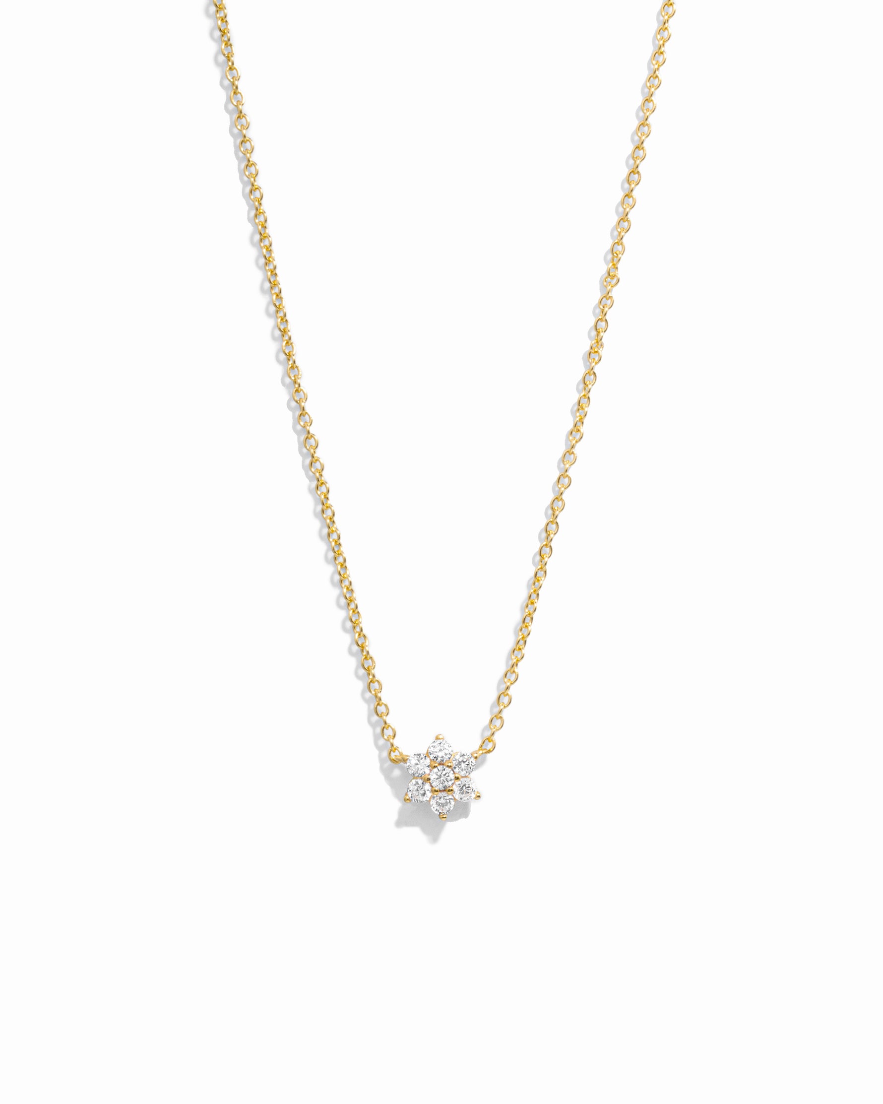 Gold necklace with cubic zirconia flower pendant