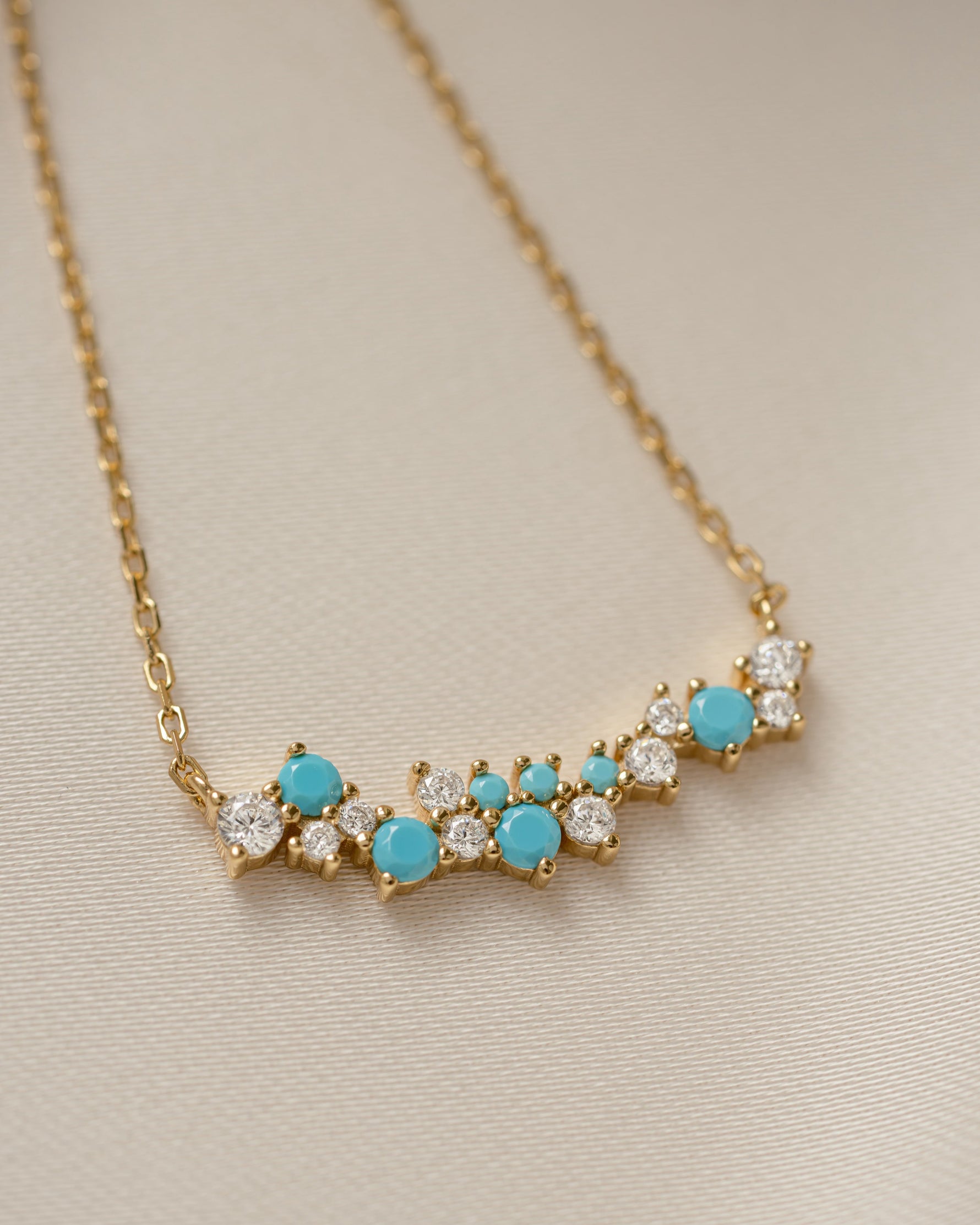 gold chain beaded necklace with turquoise and cubic zirconia stones