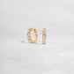 Delicate heart hoop earrings featuring a polished gold finish, great for stacking or wearing solo as a statement piece. 