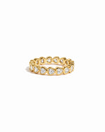 Gold eternity band with diamond hearts on a white background